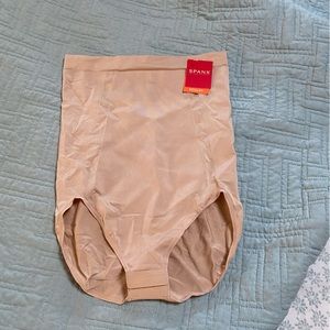 Brand new spanxs shape wear. Snap closure size large